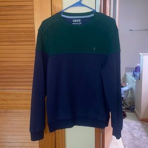 Half dark blue and green, sweatshirt.